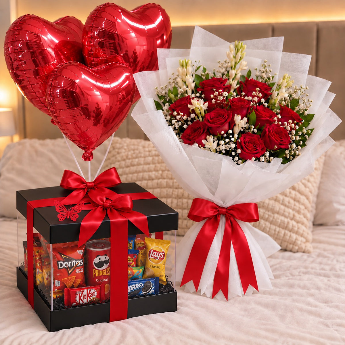 Snacks gift box with red heart balloons and red rose bouquet